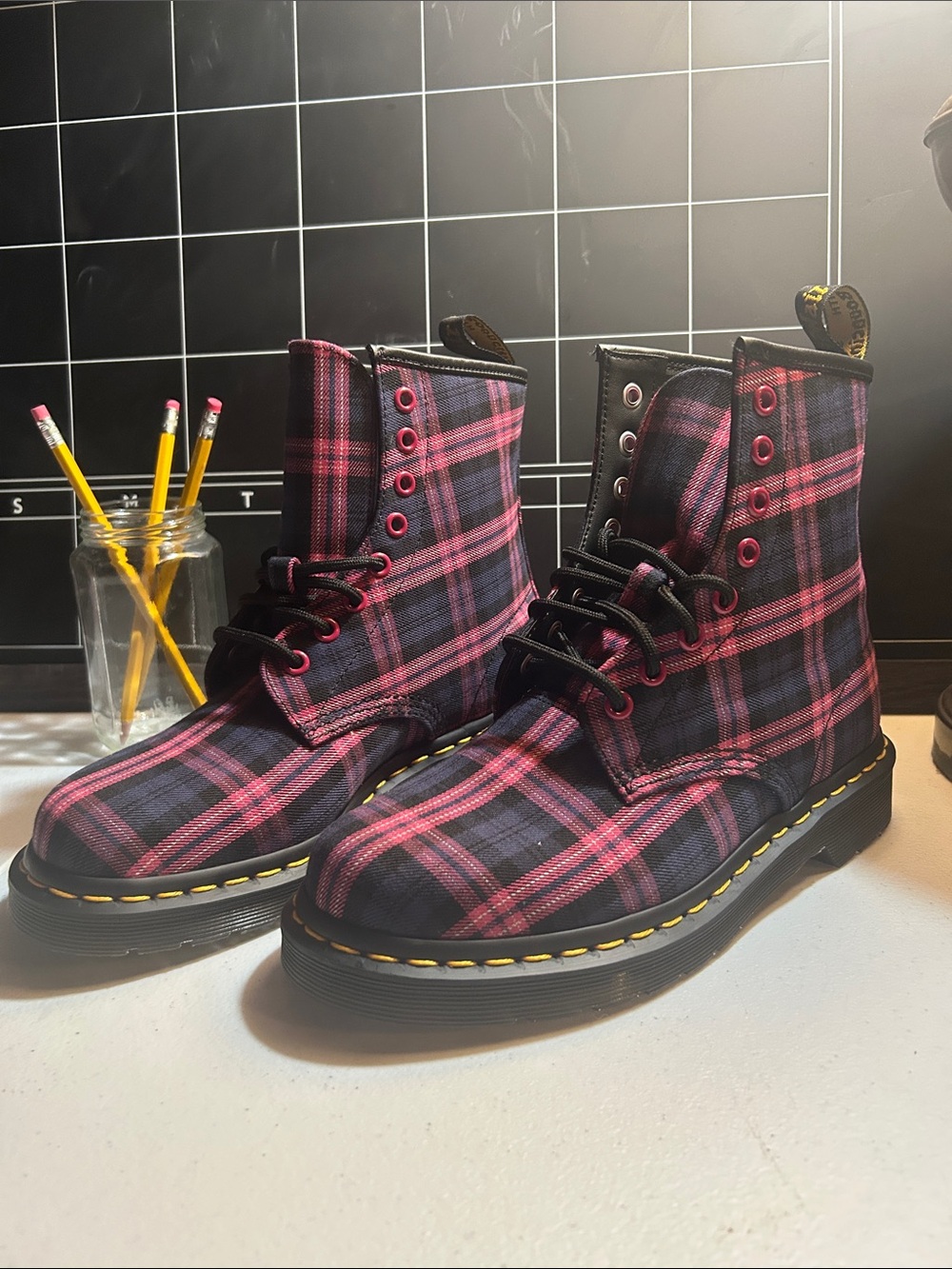 Dr. Martens Pink and Black Plaid 8-Eye Lace-Up Boots